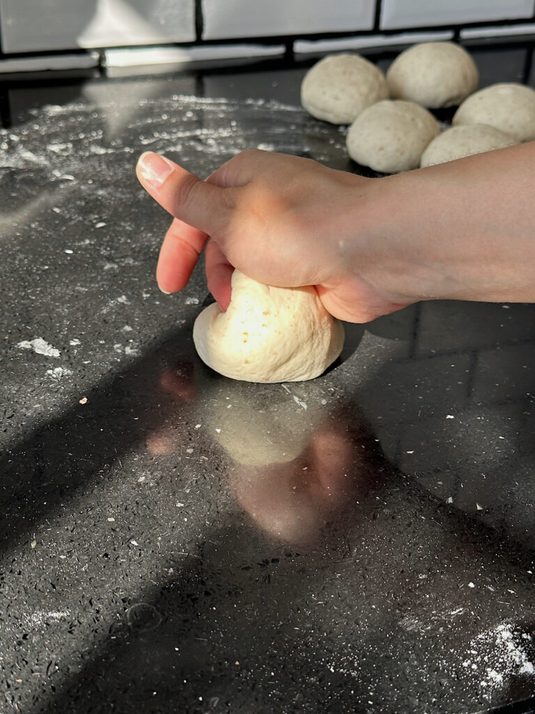Rounding the dough into small balls