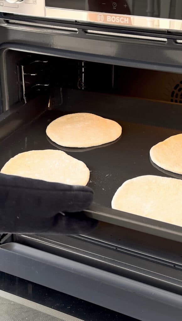 Sourdough pita bread baking